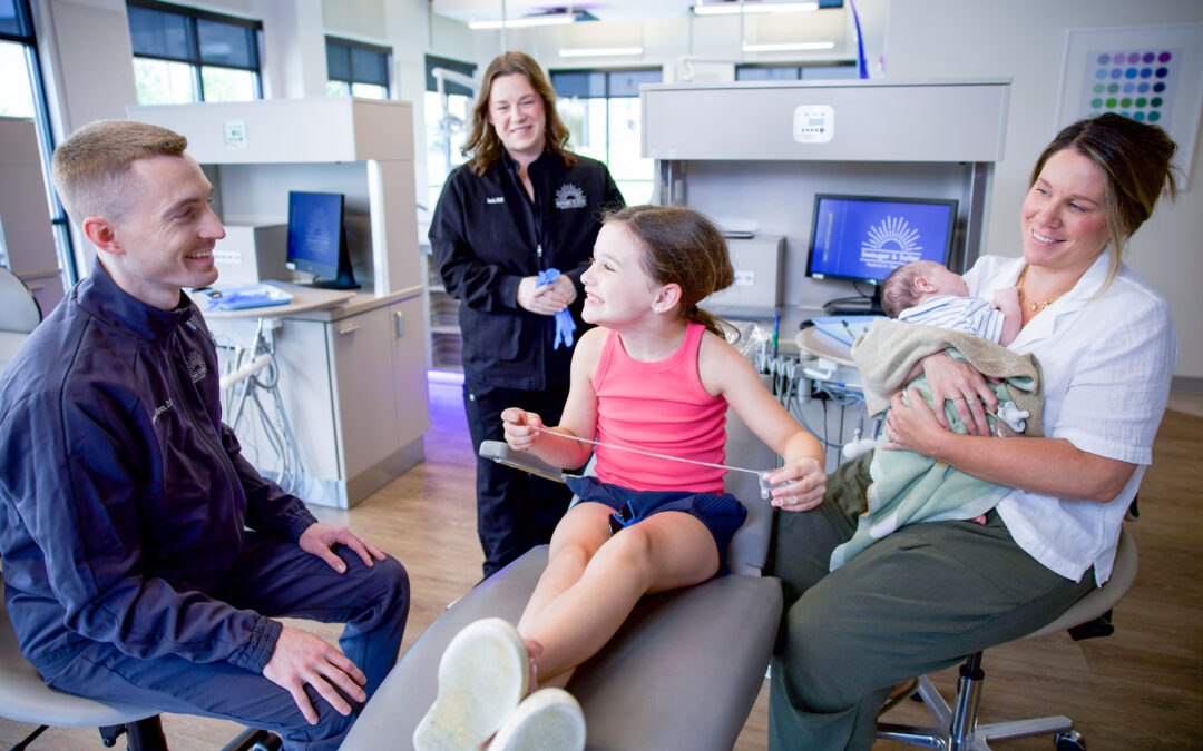 dentist treating family